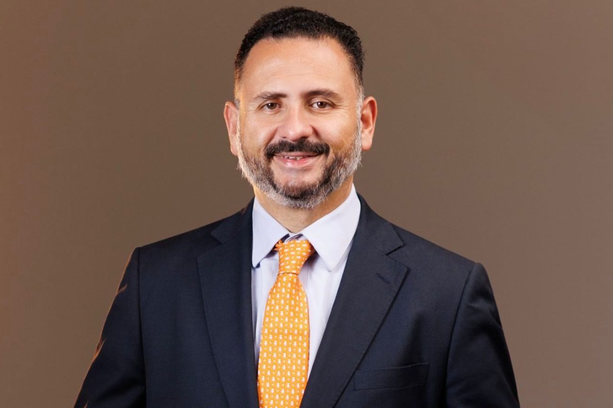 Advogado Marco Aurélio Choy usando terno escuro e gravata laranja após liderar votação da lista sêxtupla do Quinto Constitucional da OAB-AM.